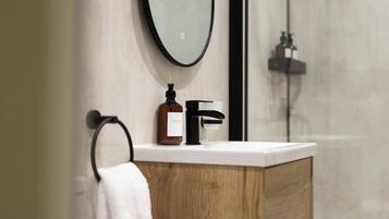 Eco-friendly toiletries, hair dryer, towels, soap