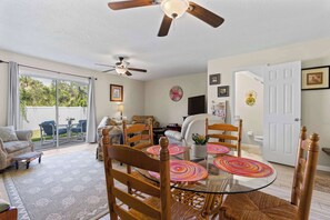 Easy access to the patio from the living room and dining area. - Intracoastal Dock & Beach Access Townhome (St. Augustine)
