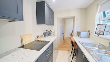 Microwave, stovetop, electric kettle, toaster