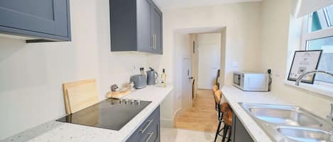 Microwave, stovetop, electric kettle, toaster