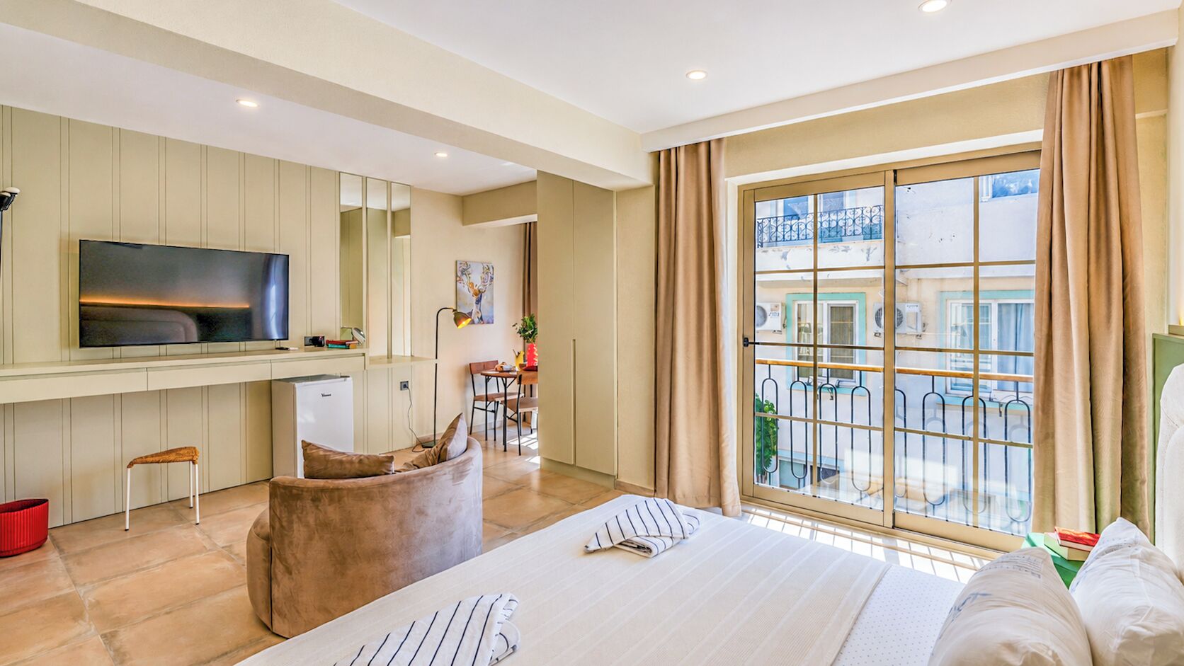 Deluxe Suite, City View | Desk, laptop workspace, iron/ironing board, free WiFi