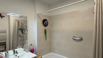 Hair dryer, towels, soap, toilet paper