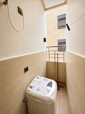 Shower, towels, toilet paper