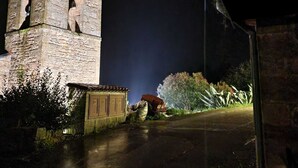 A stone building with a bell tower, a small shed, and a pathway leading to it. - Casa Los Josuco, located in the heart of the Saja-Besaya Natural Park. (Collado de Cieza)
