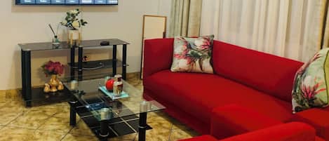 Luxury Double Room, Patio | Living area