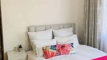 Cortinas opacas, tabla de planchar con plancha, wifi gratis