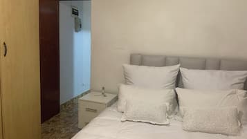 Blackout curtains, iron/ironing board, free WiFi, bed sheets