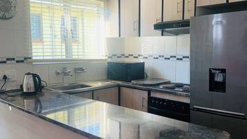 Comfort Single Room, Kitchen | Private kitchen | Shared fridge, shared microwave, toaster, cleaning supplies