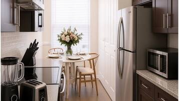 Coffee/tea maker, fridge, microwave, oven