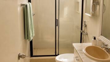 Bathroom | Hair dryer, towels, soap, toilet paper