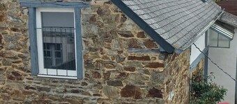 A charming little house with old-world charm, nestled between the land and the sea