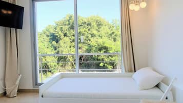 4 habitaciones, tabla de planchar con plancha, wifi y ropa de cama
