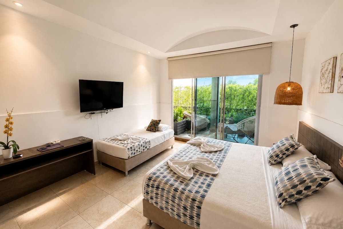 Superior Triple Room, Balcony, Garden View