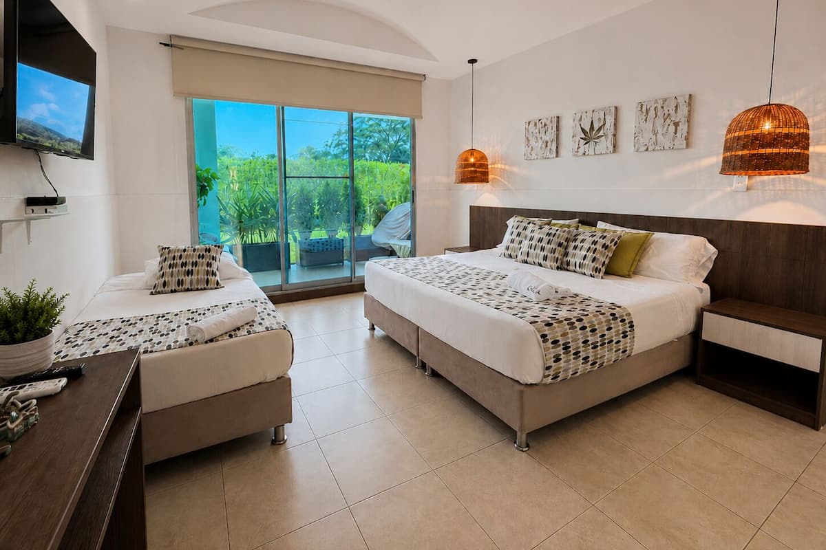 Superior Triple Room, Balcony, Garden View