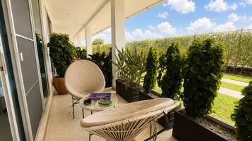 Superior Triple Room, Balcony, Garden View | View from room