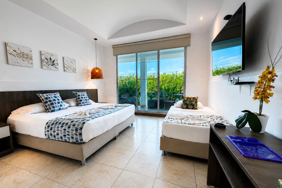 Superior Triple Room, Balcony, Garden View