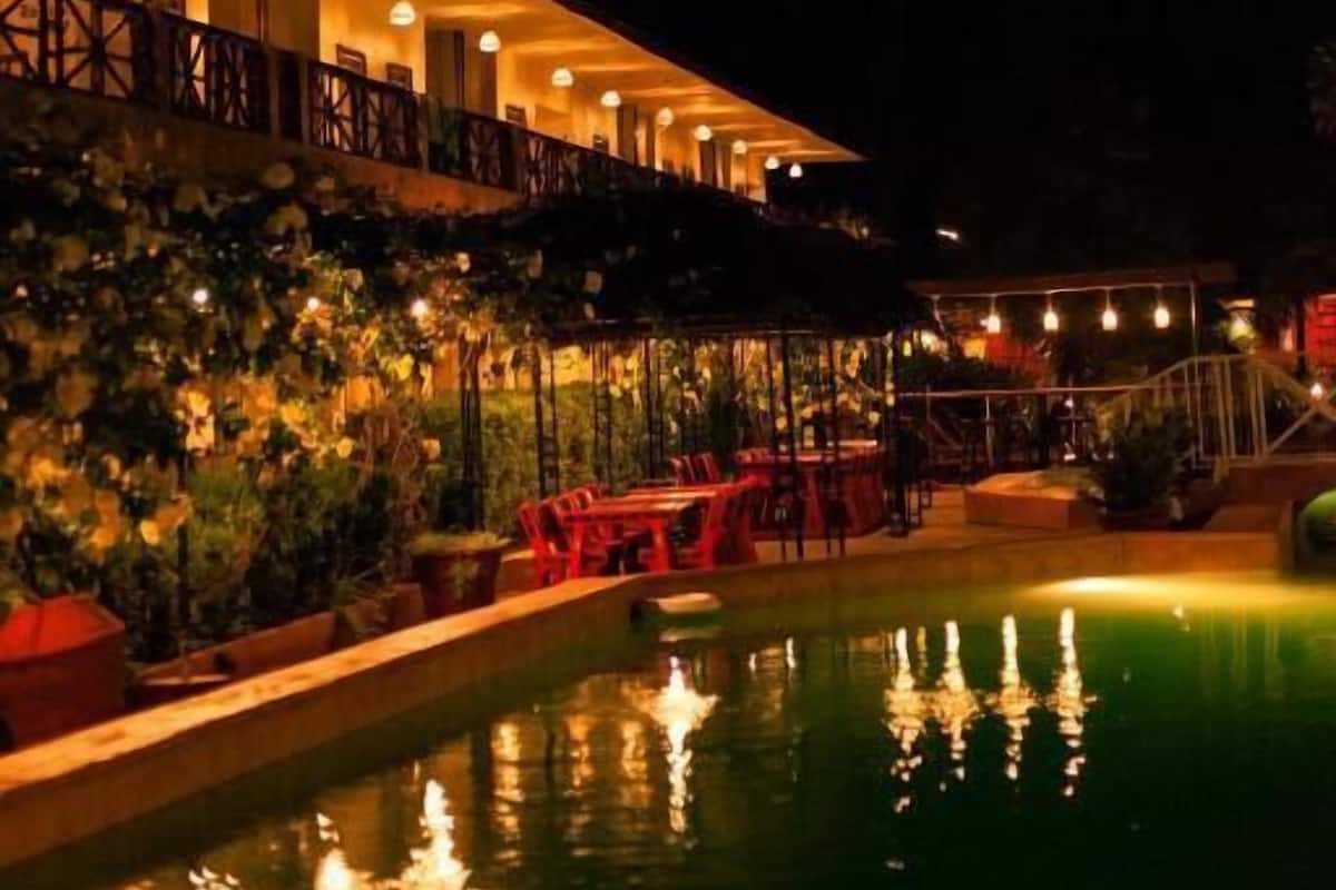 Basic Double Room, Balcony, Pool View | Pool | Outdoor pool