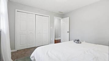 Iron/ironing board, travel crib, WiFi, bed sheets