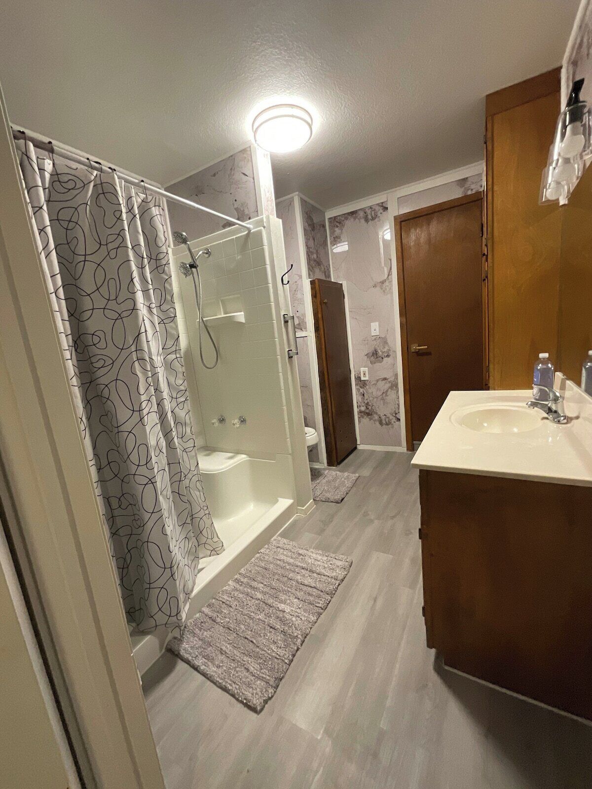 Shower, towels, soap, toilet paper