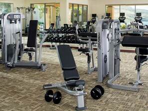 A gym with various exercise machines, free weights, and a bench. - 3 Bedroom Villa at Marriott Kaua'i Lagoons (Lihue)