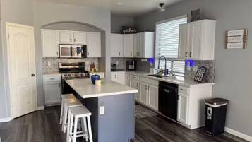Coffee/tea maker, fridge, microwave, oven