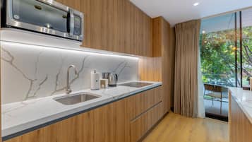 Apartamento superior, balcón, vistas a la ciudad | Cocina privada