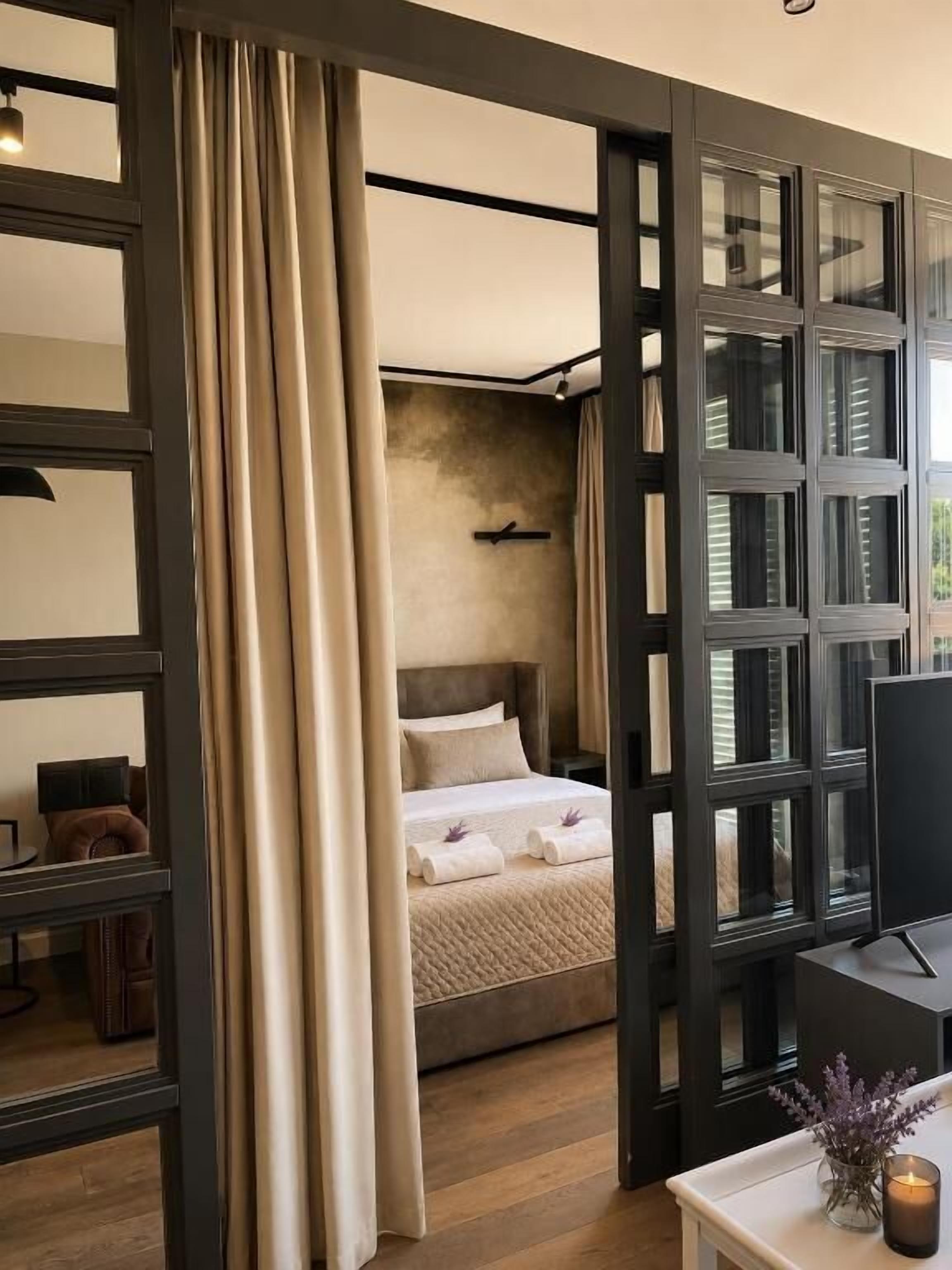 Deluxe Apartment, City View | In-room safe, blackout curtains, iron/ironing board, free WiFi