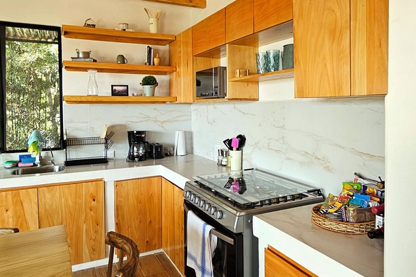 Family Villa, Partial Lake View | Private kitchen | Coffee/tea maker, full-size fridge, microwave, oven