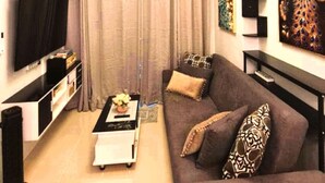 Comfort Condo, Balcony, City View | Living area - Grass Residence SM NORTH MRT NLEX PH ARENA (QUEZON CITY)
