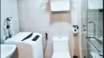Shower, slippers, towels, soap