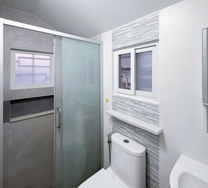 Bidet, towels, soap, toilet paper - StarNest | Cozy Private Room for 2 in a Shared Home near SM Mall Telebastagan (San Fernando)