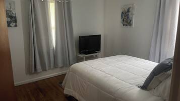 2 habitaciones, tabla de planchar con plancha y wifi gratis