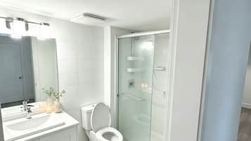 Shower, hair dryer, towels, soap