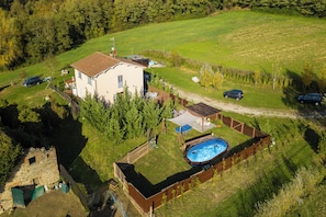 A house with a swimming pool, a fenced yard, and a small garden area. - Family Home Margherita Pool Mugello 2, Vicchio, Italy (Vicchio)