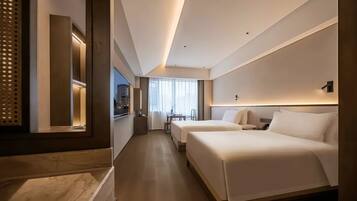 Deluxe Twin Room, Courtyard View | Premium bedding, down duvets, memory-foam beds, minibar