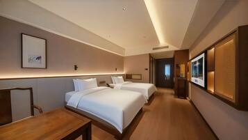 Deluxe Twin Room, Courtyard View | Premium bedding, down comforters, memory foam beds, in-room safe