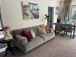 Living area - So central. Steps from Blake Park, town and a stroll to cafes and beach. (Mount Maunganui)