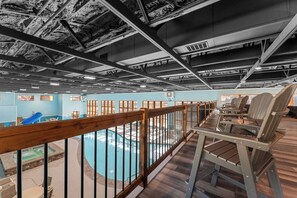 Spend the afternoon in the rocking chairs. - New Cabin in Tall Timbers! Private Indoor Pool! (Hollister)