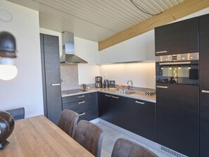 Kitchen - Luxury beach lodge by the beach. (Callantsoog)