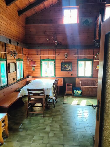 A quaint, historic wooden house in the quiet mountain village of Daxstein am Brotjacklriegel