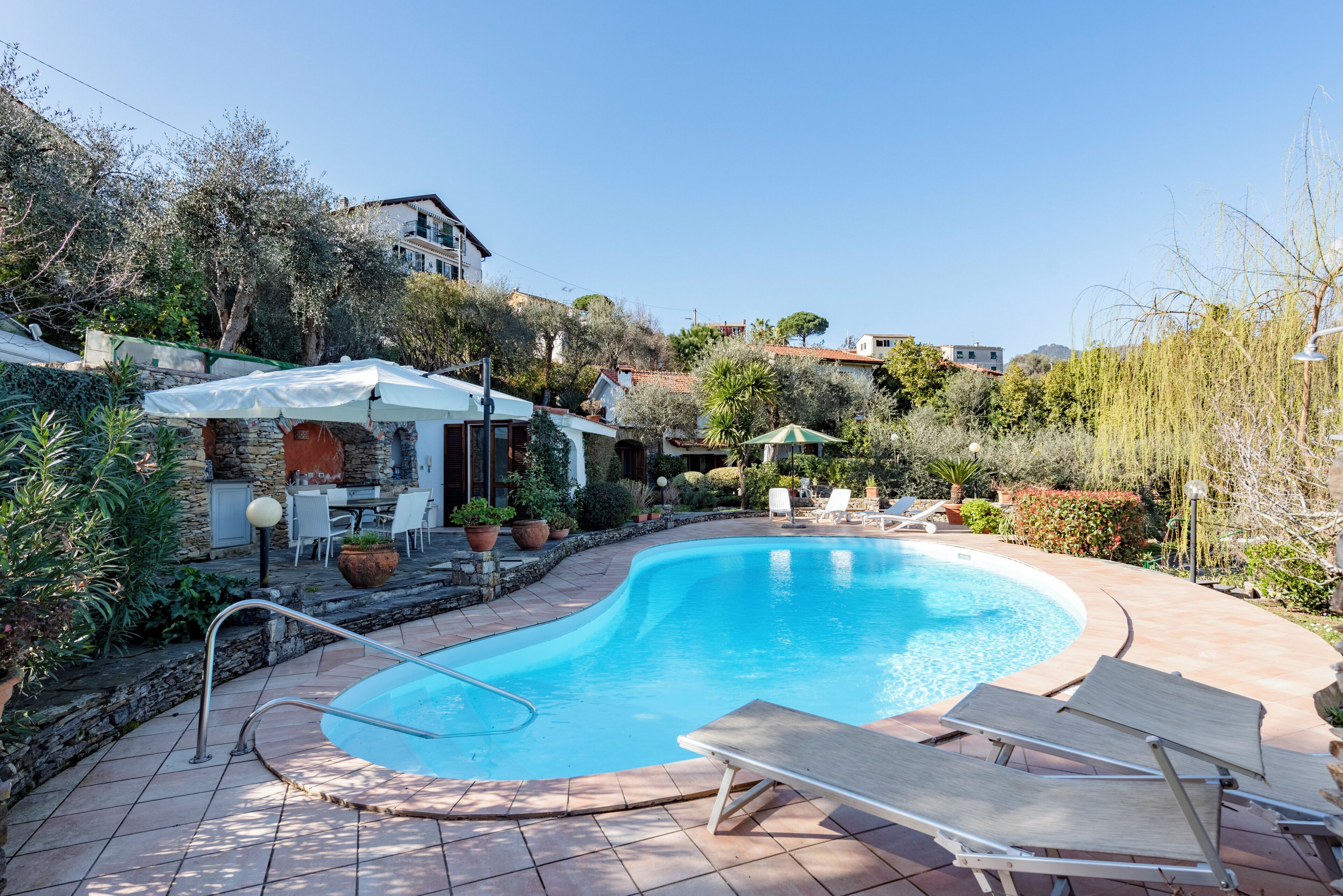 Outdoor pool, pool umbrellas, pool loungers