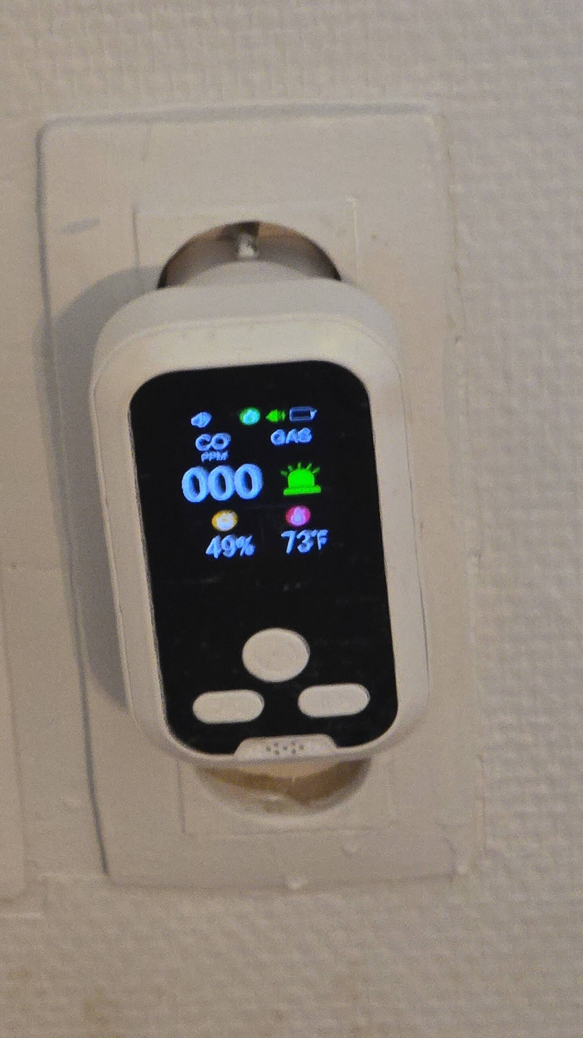 A digital thermostat displaying 000, 49%, and 73°F.