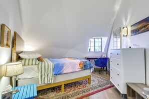A bedroom with a bed, a desk, a chair, a dresser, and a window. - Experience Staying in Geodome, Pool, Hot Tub, BBQ (Tucson)