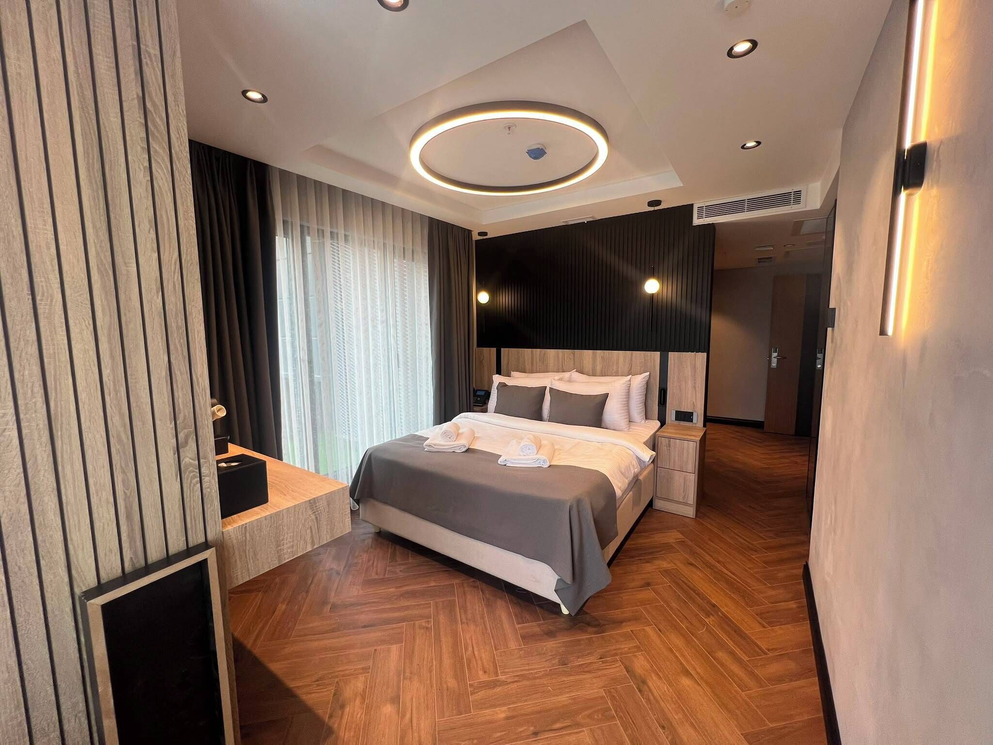 Deluxe Suite, Balcony, Sea View | Desk, laptop workspace, free WiFi