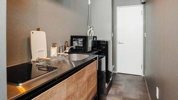 Fridge, microwave, stovetop, cookware/dishes/utensils