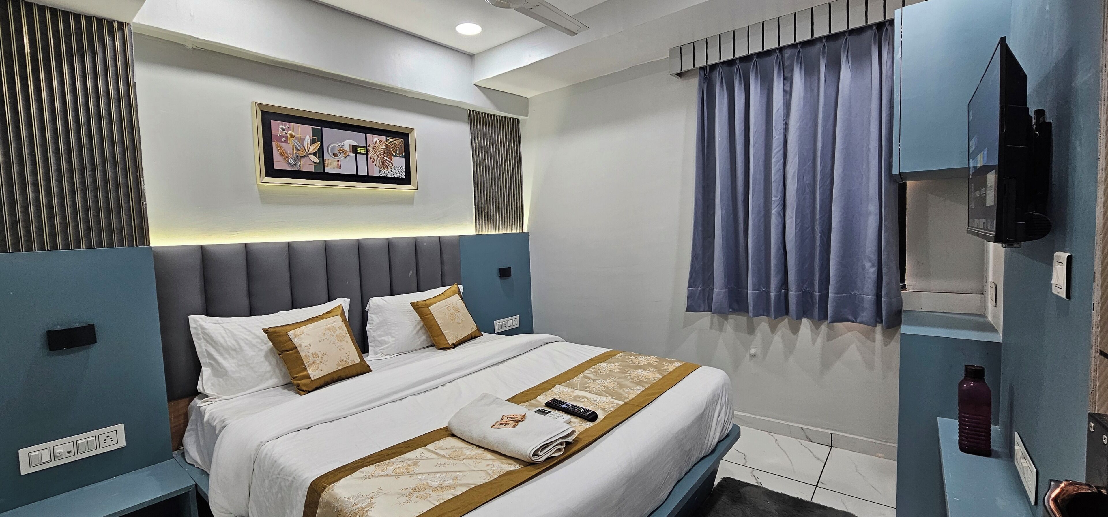 Deluxe Double Room, City View | In-room safe, desk, laptop workspace, iron/ironing board