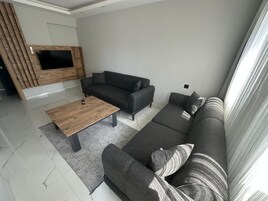 Apartamento básico | Zona de estar
