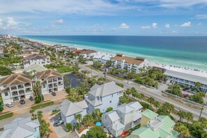 A coastal residential area with beachfront properties, a main road, and a beach. - Sandy Heels | 6BR Crystal Beach Home with Gulf Views, Private Pool & Steps to Beach | Sleeps 20 (Destin)