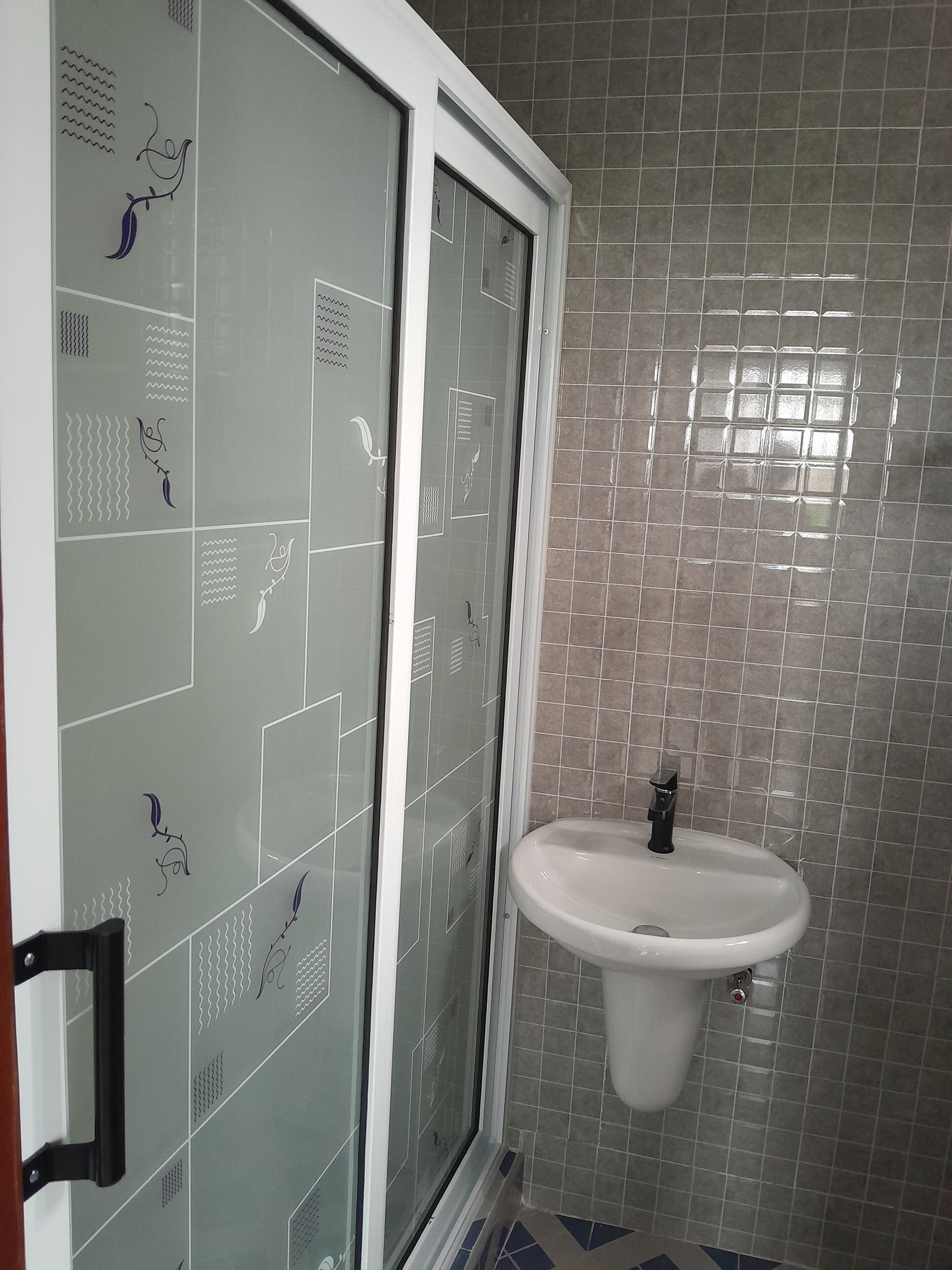 Separate bathtub and shower, towels, soap, toilet paper