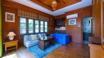 Villa, Garden View | Living area | 42-inch flat-screen TV with cable channels